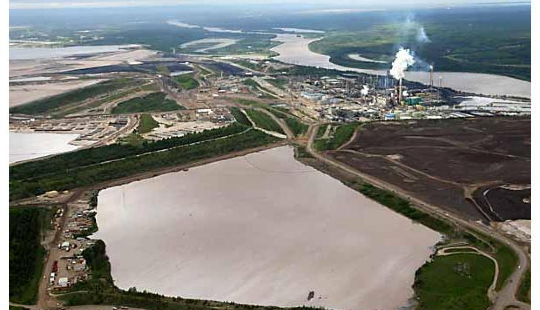 Dredging Image Suncor Tailing Pond, Dredging